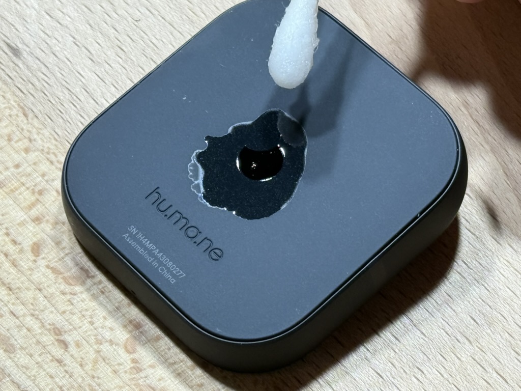 Applying isopropyl alcohol to the moon sticker